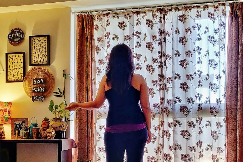 GirlWho Decor feature image by Geetika Chouhan showing warm styled home